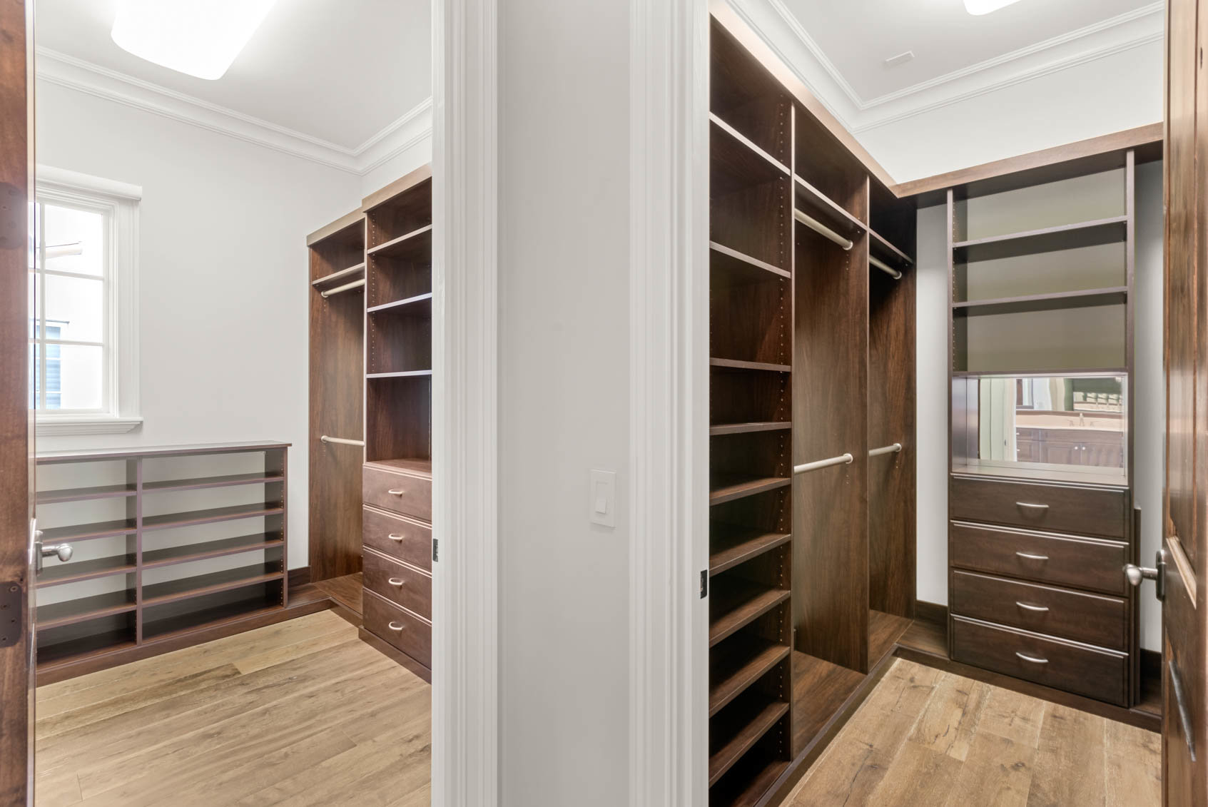 walk in closets with brown shelves